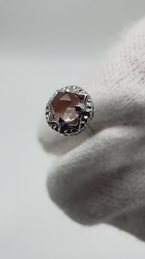 Video of threadless end affixed to pose being moved around to show height, sides, and gemstone